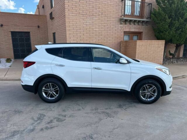 Белый Хендай Санта Фе, объемом двигателя 2.4 л и пробегом 63 тыс. км за 8000 $, фото 4 на Automoto.ua