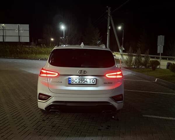 Белый Хендай Санта Фе, объемом двигателя 2 л и пробегом 145 тыс. км за 29000 $, фото 2 на Automoto.ua