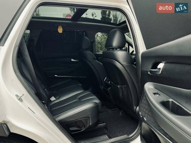 Білий Хендай Санта Фе, об'ємом двигуна 2 л та пробігом 94 тис. км за 22900 $, фото 46 на Automoto.ua