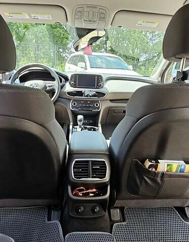 Білий Хендай Санта Фе, об'ємом двигуна 2.36 л та пробігом 108 тис. км за 22500 $, фото 11 на Automoto.ua