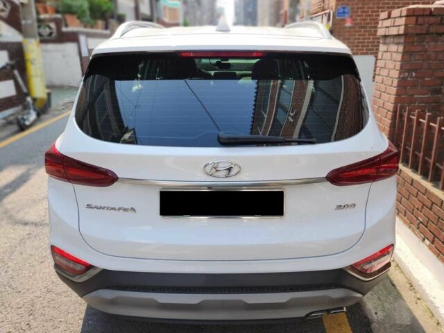 Белый Хендай Санта Фе, объемом двигателя 2 л и пробегом 87 тыс. км за 11200 $, фото 4 на Automoto.ua