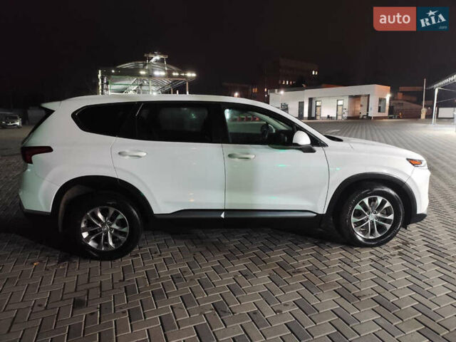 Білий Хендай Санта Фе, об'ємом двигуна 2.4 л та пробігом 136 тис. км за 20500 $, фото 4 на Automoto.ua