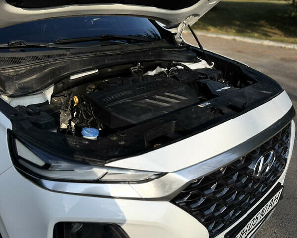 Білий Хендай Санта Фе, об'ємом двигуна 2 л та пробігом 210 тис. км за 23600 $, фото 26 на Automoto.ua