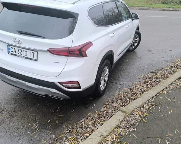 Белый Хендай Санта Фе, объемом двигателя 2.36 л и пробегом 73 тыс. км за 23800 $, фото 3 на Automoto.ua