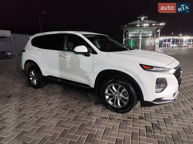 Білий Хендай Санта Фе, об'ємом двигуна 2.4 л та пробігом 136 тис. км за 20500 $, фото 2 на Automoto.ua