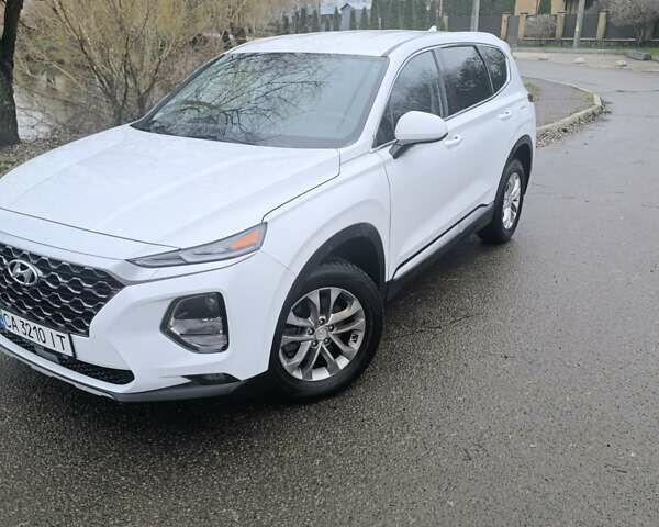 Белый Хендай Санта Фе, объемом двигателя 2.36 л и пробегом 73 тыс. км за 23800 $, фото 1 на Automoto.ua