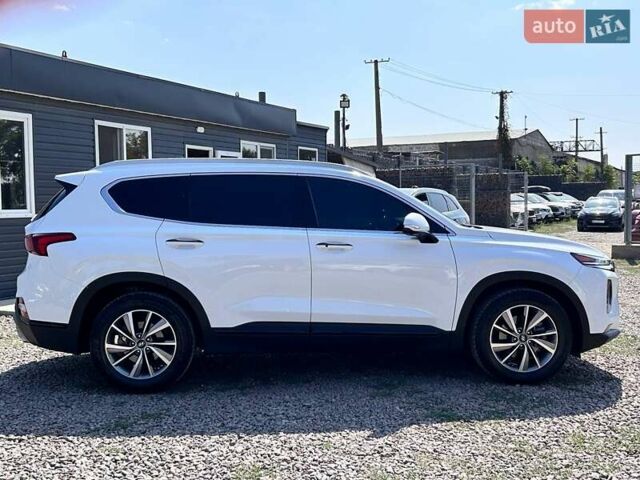 Белый Хендай Санта Фе, объемом двигателя 2.4 л и пробегом 80 тыс. км за 27500 $, фото 3 на Automoto.ua
