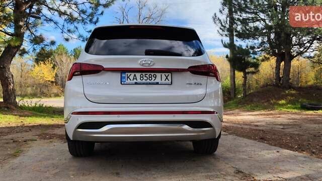 Белый Хендай Санта Фе, объемом двигателя 2.15 л и пробегом 55 тыс. км за 44999 $, фото 2 на Automoto.ua