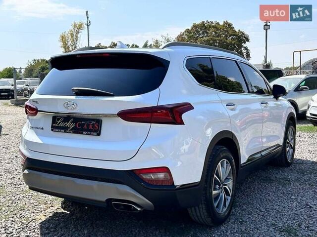 Белый Хендай Санта Фе, объемом двигателя 2.4 л и пробегом 80 тыс. км за 27500 $, фото 4 на Automoto.ua