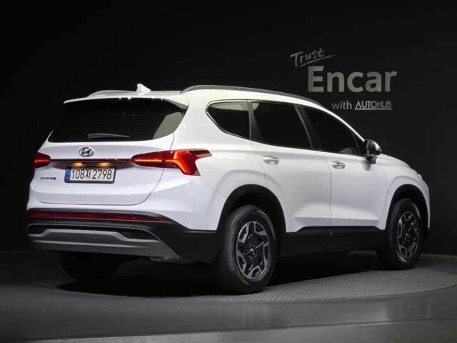 Белый Хендай Санта Фе, объемом двигателя 1.6 л и пробегом 24 тыс. км за 23000 $, фото 2 на Automoto.ua