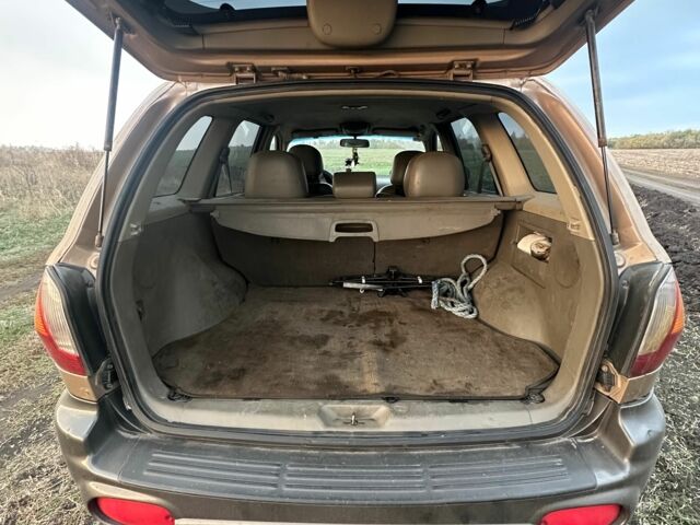 Бежевий Хендай Санта Фе, об'ємом двигуна 2 л та пробігом 385 тис. км за 4300 $, фото 2 на Automoto.ua