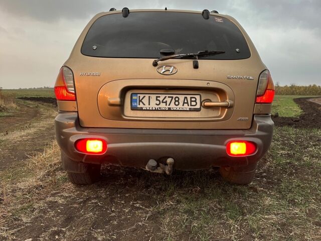 Бежевий Хендай Санта Фе, об'ємом двигуна 2 л та пробігом 385 тис. км за 4300 $, фото 5 на Automoto.ua
