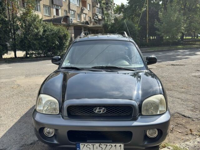 Черный Хендай Санта Фе, объемом двигателя 2 л и пробегом 257 тыс. км за 3700 $, фото 4 на Automoto.ua