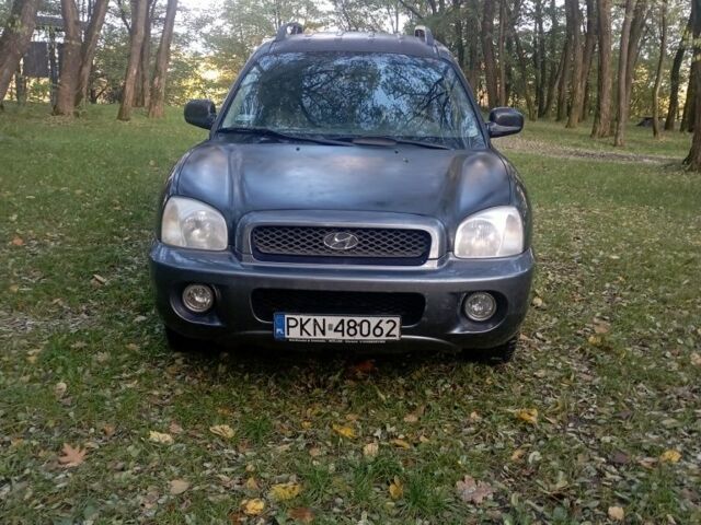 Черный Хендай Санта Фе, объемом двигателя 2 л и пробегом 300 тыс. км за 3200 $, фото 1 на Automoto.ua