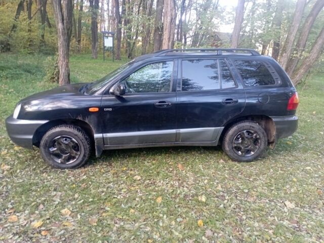 Черный Хендай Санта Фе, объемом двигателя 2 л и пробегом 300 тыс. км за 3200 $, фото 2 на Automoto.ua