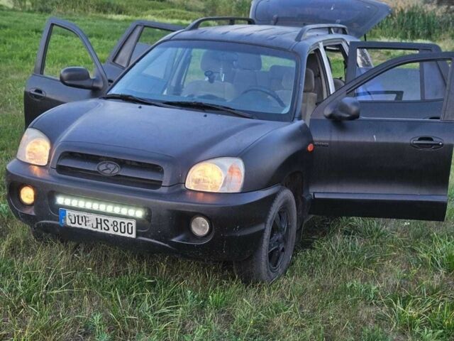 Чорний Хендай Санта Фе, об'ємом двигуна 2 л та пробігом 305 тис. км за 3190 $, фото 5 на Automoto.ua