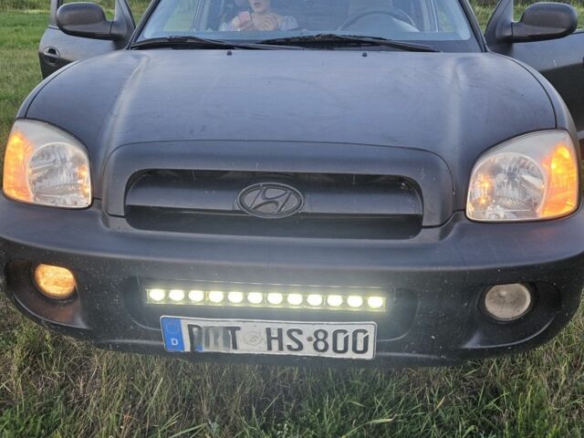 Чорний Хендай Санта Фе, об'ємом двигуна 2 л та пробігом 305 тис. км за 3190 $, фото 6 на Automoto.ua