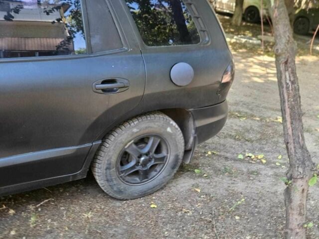 Чорний Хендай Санта Фе, об'ємом двигуна 2 л та пробігом 305 тис. км за 3190 $, фото 10 на Automoto.ua
