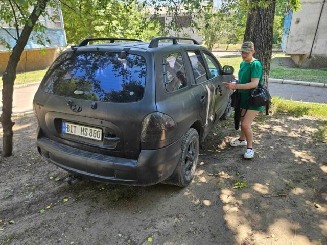Черный Хендай Санта Фе, объемом двигателя 2 л и пробегом 305 тыс. км за 3098 $, фото 12 на Automoto.ua
