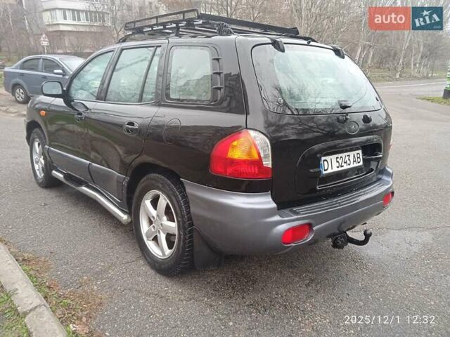 Черный Хендай Санта Фе, объемом двигателя 1.99 л и пробегом 359 тыс. км за 4500 $, фото 16 на Automoto.ua