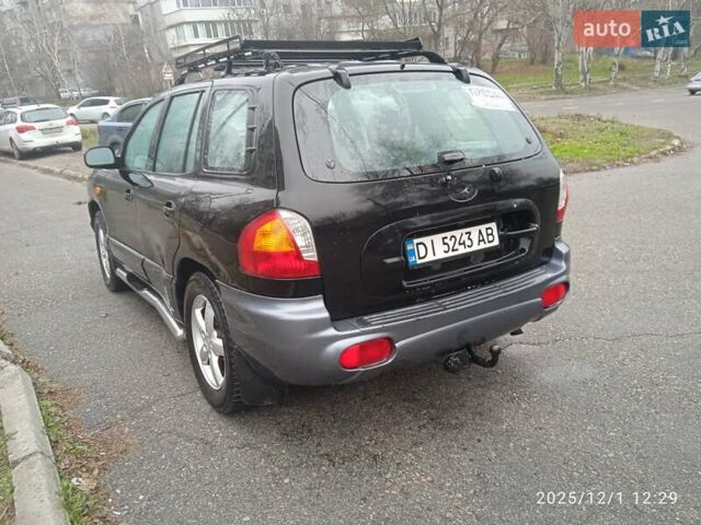 Черный Хендай Санта Фе, объемом двигателя 1.99 л и пробегом 359 тыс. км за 4500 $, фото 4 на Automoto.ua