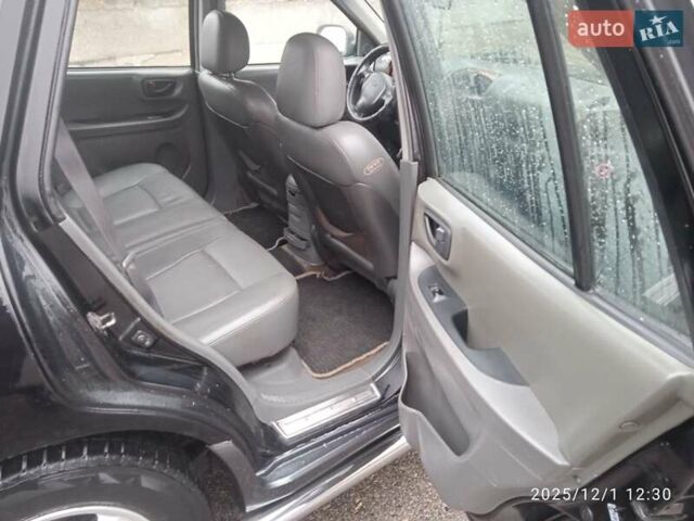 Черный Хендай Санта Фе, объемом двигателя 1.99 л и пробегом 359 тыс. км за 4500 $, фото 10 на Automoto.ua