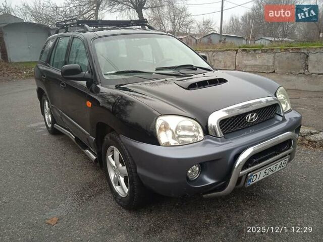 Черный Хендай Санта Фе, объемом двигателя 1.99 л и пробегом 359 тыс. км за 4500 $, фото 1 на Automoto.ua