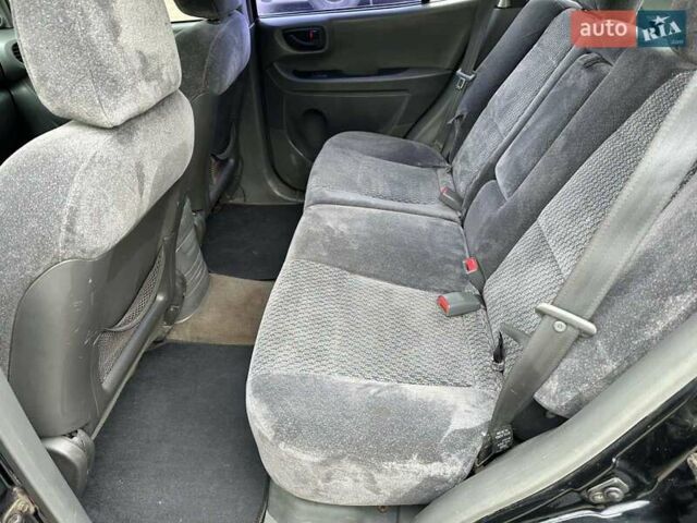 Черный Хендай Санта Фе, объемом двигателя 2 л и пробегом 260 тыс. км за 5000 $, фото 7 на Automoto.ua