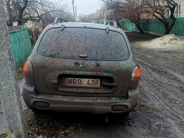 Чорний Хендай Санта Фе, об'ємом двигуна 20 л та пробігом 300 тис. км за 1840 $, фото 1 на Automoto.ua