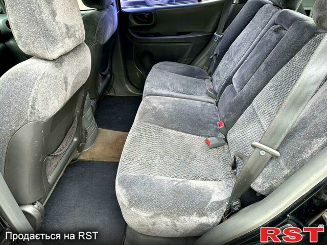 Черный Хендай Санта Фе, объемом двигателя 2 л и пробегом 260 тыс. км за 5000 $, фото 3 на Automoto.ua