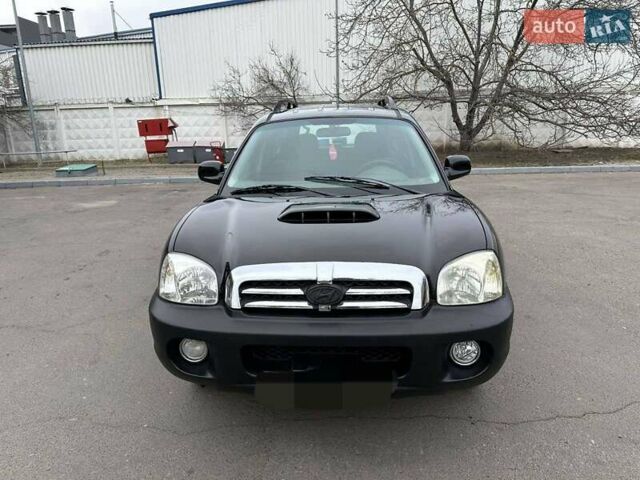 Черный Хендай Санта Фе, объемом двигателя 2 л и пробегом 260 тыс. км за 5000 $, фото 4 на Automoto.ua