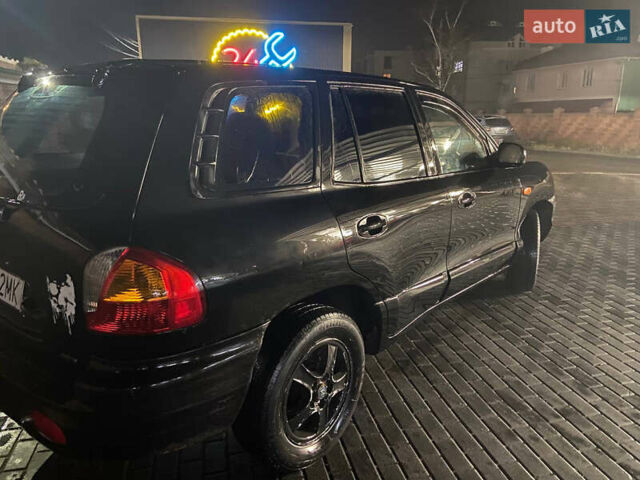 Чорний Хендай Санта Фе, об'ємом двигуна 0 л та пробігом 300 тис. км за 1900 $, фото 1 на Automoto.ua