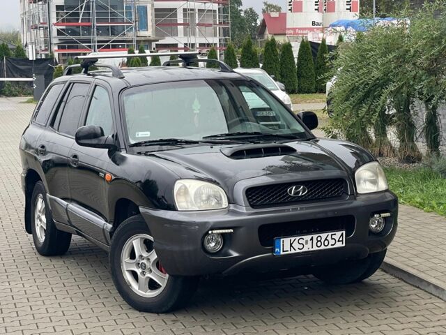 Черный Хендай Санта Фе, объемом двигателя 2 л и пробегом 300 тыс. км за 2925 $, фото 2 на Automoto.ua