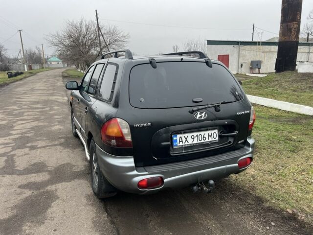Чорний Хендай Санта Фе, об'ємом двигуна 2 л та пробігом 350 тис. км за 6999 $, фото 4 на Automoto.ua