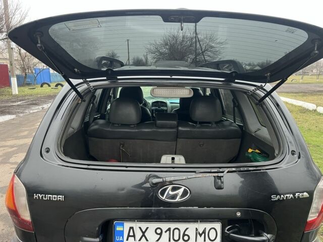 Чорний Хендай Санта Фе, об'ємом двигуна 2 л та пробігом 350 тис. км за 6999 $, фото 17 на Automoto.ua