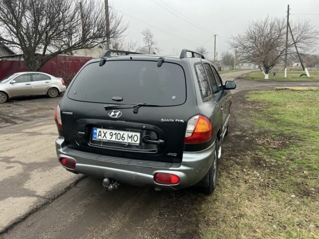 Чорний Хендай Санта Фе, об'ємом двигуна 2 л та пробігом 350 тис. км за 6999 $, фото 5 на Automoto.ua