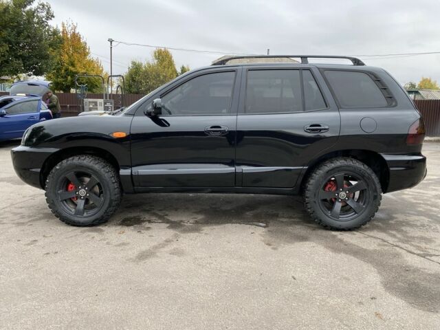 Чорний Хендай Санта Фе, об'ємом двигуна 2 л та пробігом 288 тис. км за 5400 $, фото 6 на Automoto.ua