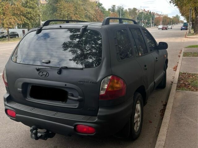 Черный Хендай Санта Фе, объемом двигателя 2 л и пробегом 438 тыс. км за 4299 $, фото 2 на Automoto.ua