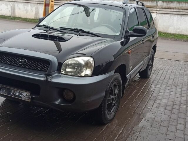 Чорний Хендай Санта Фе, об'ємом двигуна 2 л та пробігом 345 тис. км за 2700 $, фото 1 на Automoto.ua