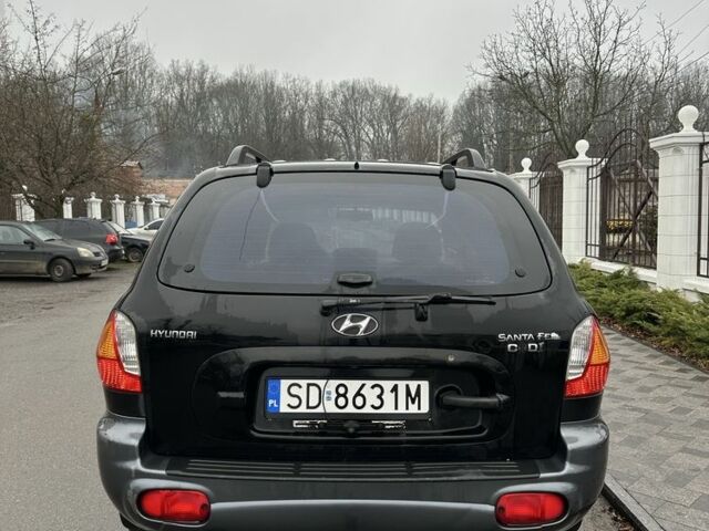 Чорний Хендай Санта Фе, об'ємом двигуна 2 л та пробігом 300 тис. км за 2700 $, фото 4 на Automoto.ua