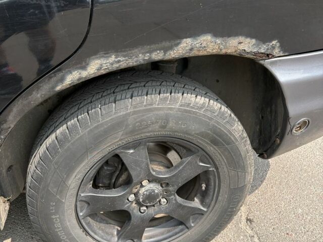 Черный Хендай Санта Фе, объемом двигателя 2.7 л и пробегом 300 тыс. км за 2300 $, фото 2 на Automoto.ua