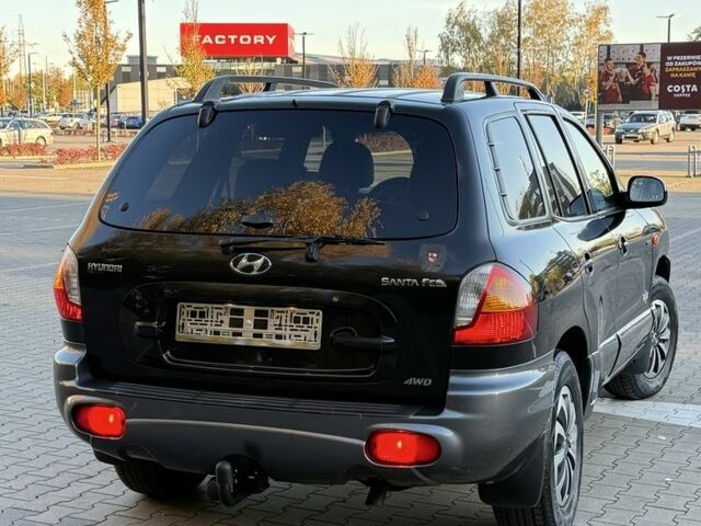 Черный Хендай Санта Фе, объемом двигателя 0 л и пробегом 190 тыс. км за 3800 $, фото 3 на Automoto.ua
