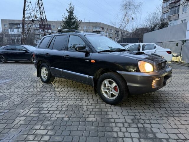 Черный Хендай Санта Фе, объемом двигателя 2 л и пробегом 340 тыс. км за 3500 $, фото 3 на Automoto.ua