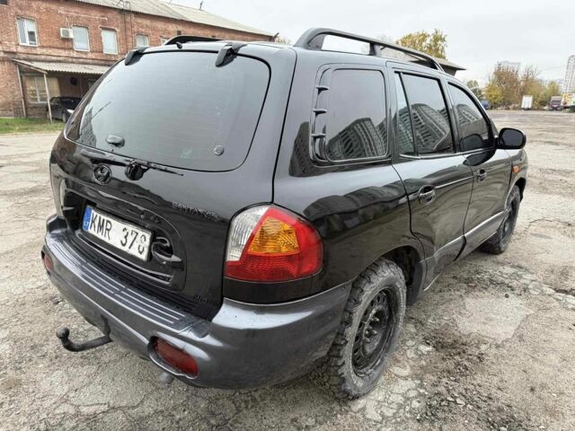 Черный Хендай Санта Фе, объемом двигателя 2 л и пробегом 278 тыс. км за 2500 $, фото 5 на Automoto.ua