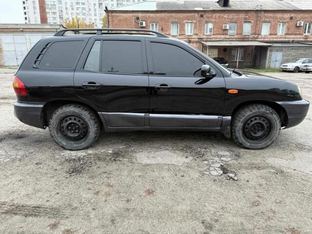Черный Хендай Санта Фе, объемом двигателя 2 л и пробегом 278 тыс. км за 2500 $, фото 4 на Automoto.ua