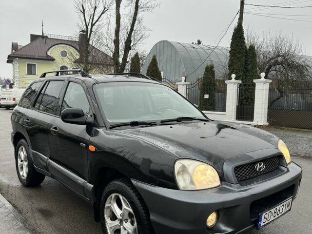 Чорний Хендай Санта Фе, об'ємом двигуна 2 л та пробігом 300 тис. км за 2700 $, фото 1 на Automoto.ua