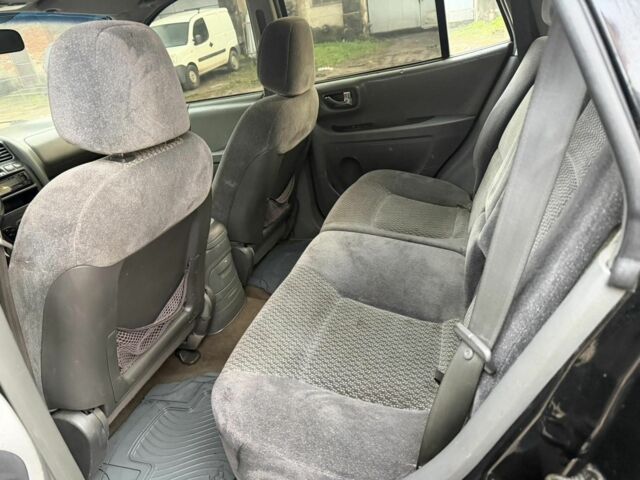 Черный Хендай Санта Фе, объемом двигателя 2 л и пробегом 266 тыс. км за 3200 $, фото 7 на Automoto.ua