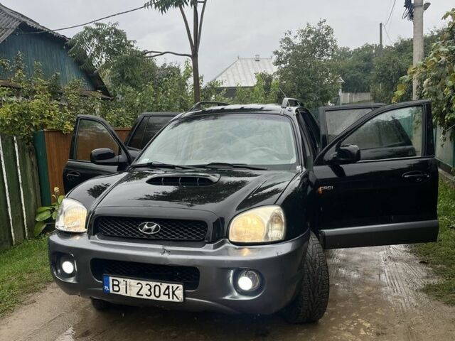 Чорний Хендай Санта Фе, об'ємом двигуна 2 л та пробігом 271 тис. км за 3400 $, фото 20 на Automoto.ua