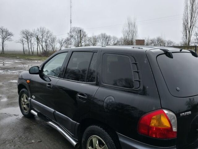 Черный Хендай Санта Фе, объемом двигателя 0 л и пробегом 240 тыс. км за 3200 $, фото 5 на Automoto.ua