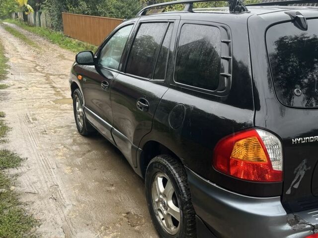 Чорний Хендай Санта Фе, об'ємом двигуна 2 л та пробігом 271 тис. км за 3400 $, фото 3 на Automoto.ua